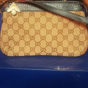 Gucci wristlet